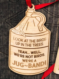 "Look at the birds up in the trees. Yeah Well, we're not birds. We're a JUG-BAND!" in jug shape.